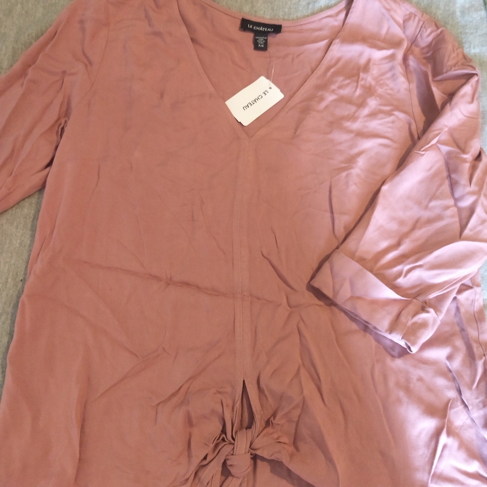 Beautiful light tie bottom blouse